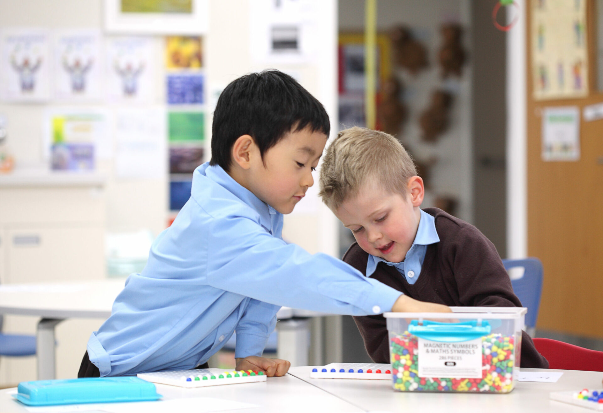 NLCS Jeju junior school pupils playing and learning during a maths lesson - NLCS International Homepage